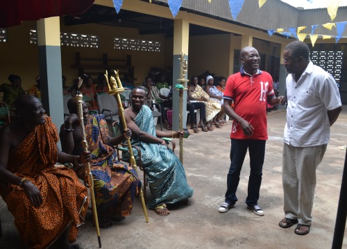 Dr. James King and Alex Boamah meet chiefs from the Amanokrom village.  